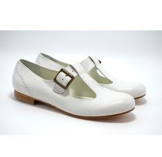 Vintage Style inspired Wedding Flat shoes. Wide T-Bar Strap Ballerina Shoes prove to be more contemporary than one could imagine. This pair sits on a low block heel that will ensure comfort and stability. Mary Janes that feature a side buckle fastening, bronze tone hardware, round toe and lightweight. This pair sits on leather Sole. Anatomicaly cushioned all along with foamy material inner sole for comfort walking. Genuine italian leathers are always used. The leather texture may slightly defer Bride Flats, Womens Mary Janes, Wedding Shoes Flats, Wedding Flats, White Heels, Mary Jane Flats, Ballerina Shoes, Low Block Heels, Womens Wedding Shoes