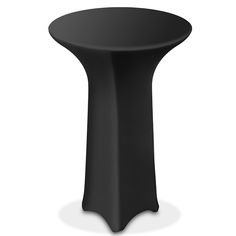 a black round table sitting on top of a white floor