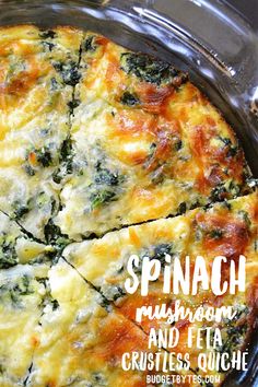 spinach mushroom and feta crustless quiche is cut into four slices in a pan