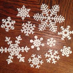 white snowflakes on a wooden table