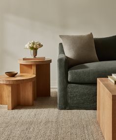 a living room scene with focus on the couch and coffee table in the center area