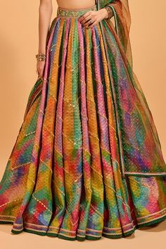 Multicolored attached cancan panelled lehenga with mirror embroidery. Paired with a floral embroidered padded blouse with a taselled hem and dupatta. - Aza Fashions Anarkali Lehenga With Multicolor Embroidery And Sequins, Bollywood Style Lehenga With Multicolor Embroidery And Sequins, Bollywood Sequined Lehenga With Multicolor Embroidery, Festive Multicolor Embroidered Lehenga With Sequins, Multicolor Sequined Sets For Reception, Multicolor Sequined Choli For Wedding, Wedding Choli With Sequins In Multicolor, Multicolor Sequins Sets For Diwali, Multicolor Sequined Sets For Diwali