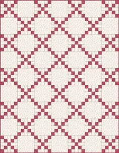 a red and white quilt with squares on the front, one in the middle is shown