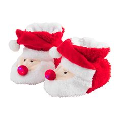 a pair of red and white santa claus slippers