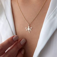 Embrace the beauty of transformation with our 14k solid gold dragonfly necklace. Lightweight and exquisitely crafted, this delicate piece captures the essence of elegance and change. Each detail of the dragonfly is a testament to our commitment to the finest craftsmanship, making it a perfect symbol of grace and freedom for your everyday style. This necklace is crafted with real 14k solid gold(not plated, not vermeil, not gold filled) You don't need to worry about water, perfume or conditioner contact since real gold doesn't tarnish. About Water, Pendants Necklaces, Dragonfly Necklace, August Birthstone Jewelry, July Birthstone Jewelry, Dragonfly Pendant, Zodiac Jewelry, Vermeil Jewelry, Jewelry Ring Box