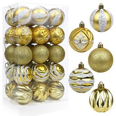 a bunch of gold and silver christmas ornaments