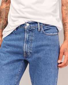 Step into the nostalgia of the 90s with Abercrombie & Fitch's Men's 90s Straight Jean. These jeans are the epitome of vintage cool with a relaxed fit through the thigh and a straight leg, elevated by a slightly higher rise. Perfect for those who cherish authentic 90s style, each pair is crafted from a vintage stretch fabric that offers both comfort and durability.

- Size: 29 X 32
- Color: Medium Wash
- Material: Cotton, Elastane
- Gender: Male
- Features: Frayed hem, relaxed fit, straight leg, 90s Straight Jeans, Mens 90s, Men's Bottoms, Mens Bottom, Straight Jeans, Abercrombie Fitch, Medium Size, Mens Jeans, Thrift Store