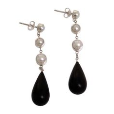 Dark as night a sleek ebony teardrop falls from pearl hemispheres. Caine sets them in silver for earrings of exceptional beauty. .925 Sterling silver Wood Dangle Earrings, Paw Print Jewelry, Ribbon Jewelry, Silver Wood, Printed Jewelry, Pearl Earrings Dangle, Balinese, Silver Pearls, Pricing Jewelry