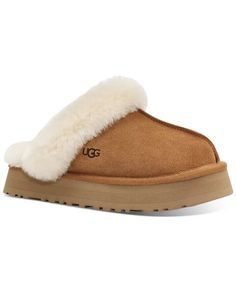 Suede upper Sheepskin collar 17mm sheepskin lining 17mm sheepskin insole EVA midsole Sugarcane EVA outsole or Treadlite by UGG™ EVA outsole Textile binding made from 100% recycled polyester fibers 1" platform height Woven label with The UGG® Logo on insole, The UGG® Logo, heat-embossed RN 88276 This product contains real fur from sheep or lamb. Fur may be sourced from Australia, Ireland, the United Kingdom, or the United States. It has been artificially dyed and treated.  We ship out orders Fast! All Sales are final. No return or exchange. Before make a order, please make sure the size and address is all correct!!! Thank you for choosing us. Chestnut Brown Color, Royalty Fashion, Disco Style, Flowy Midi Dress, Platform Flats, Suede Slippers, Ugg Slippers, Platform Slippers, Woven Labels