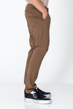 Elevate your everyday style with our men's casual wear pants, designed for both comfort and convenience. With a classic design featuring straight or tapered legs, they boast details like belt loops, pockets, and a zip fly with button closure for timeless appeal. Whether you're running errands or heading to a casual outing, these pants effortlessly adapt to any occasion. Versatile and stylish, they pair seamlessly with a range of tops, allowing you to create effortlessly put-together looks with e Brown Tapered Leg Bottoms For Business Casual, Brown Tapered Leg Business Casual Bottoms, Brown Chinos With Pockets And Straight Hem, Brown Straight Pants With Hip Pockets, Brown Straight Leg Pants With Side Pockets, Brown Tapered Leg Chinos With Welt Pockets, Brown Straight Chinos With Belt Loops, Brown Tapered Leg Chinos With Belt Loops, Brown Straight Leg Bottoms With Side Pockets