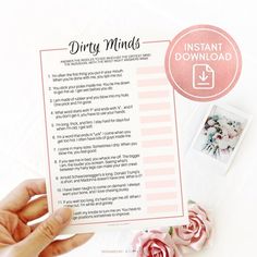 a hand holding up a printable diy mind card next to flowers and photos