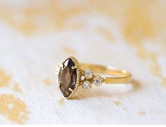 Engagement Gold ring with stone, Gem stone ring, Gold ring with Smoky Quarts, 14k Gold ring, Gold ring with brown stone. This handmade Gold ring with stone is made of 14K genuine gold and set with Smoky Quarts stone. This Stunning Ring is set with 1 carat Best AAA+ Quality Natural Smoky Quarts set in 14k Yellow Gold. High end finish. This 14k Gold ring with blue stone can serve as an engagement ring or a birthday gift. All colors at the picture are available. * Gemstone -5/10mm Marquise Natural Fine Jewelry 14k Gold Brown Ring, Brown 14k Gold Fine Jewelry Ring, Brown 14k Gold Rings Fine Jewelry, Brown Gemstone Rings For Anniversary, 14k Gold Brown Ring, Brown Gemstone Rings In 14k Gold, Brown 14k Gold Wedding Jewelry, Brown Engagement Ring, Gold Ring With Stone