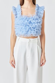 This Ruffled Shoulder Strap Tulle Top will add a bit of class and sass to your wardrobe. Featuring a cropped length sleeveless top and delicate ruffled shoulder straps it's the perfect addition to any outfit. Add it to a skirt or dress or simply style it with jeans and heels. Cropped length Ruffled shoulder straps Sleeveless Lined Hand wash cold Do not bleach Do not tumble dry Iron low Shell: 100% Polyester Lining: 90% Polyester 10% Spandex Exclusive of Elastic JJ2152T Total length: 15.5" Bust: 30" XS POWDER BLUE: Height 5'9" / Bust 30.5" / Waist 24" / Hips 34.5" Tulle Top, Top Sales, Powder Blue, Shoulder Straps, Sleeveless Top, Bleach, Shoulder Strap, Hand Wash, Elastic