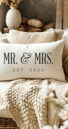 a white pillow with the words mr and mrs on it