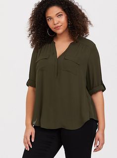 Made from a crisp and fluid fabric, the Harper lends graceful movement to a polished look that's boardroom to brunch approved. Georgette fabric. Split neck with concealed buttons. 3/4 length tab sleeves. Chest pockets. Shirttail hem. CONTENT + CARE: Polyester. Wash cold; dry flat. Imported plus size tops. SIZE + FIT: Model is 5'8”, size 1. Size 2 measure 32” from shoulder. The best plus size women's harper georgette pullover 3/4 sleeve blouse the in amber olive made of georgette. These dressy cl Georgette Blouse, Career Wear, Women Plus Size, Tunic Length, Plus Size Blouses, Cut And Style, Plus Size Tops, Half Sleeves, Blouse Designs