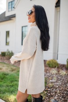 Details Beige sweater dress Soft fabric has stretch, relaxed fit, lightweight Turtleneck with long sleeves, side split detail, and ribbed hem Pair this cute dress with a fedora and all boots Size small from shoulder to hem: 32" Material and Care 55% cotton, 35% polyster, 5% raylon, and 5% nylon Machine wash cold, tumble dry low Patterns may vary Materials may have natural variations Colors may vary from different viewing devices. Casual Ribbed Turtleneck Sweater Dress, Long Ribbed Sweater For Fall, Casual Turtleneck Sweater Dress For Spring, Winter Knee-length Knit Sweater Dress, Knee-length Knit Sweater Dress For Winter, Chic Beige Sweater Dress For Fall, Casual Ribbed Sweater Dress For Fall, Long Ribbed Sweater Dress For Fall, Beige Knee-length Sweater Dress For Winter