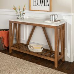 a dog bowl is sitting on top of a wooden table with a sign above it