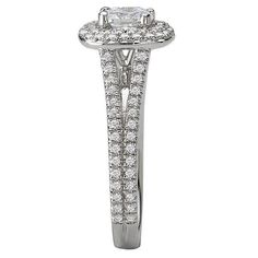 an engagement ring with two rows of diamonds on the band and a center stone in the middle