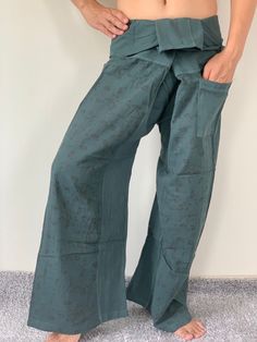 "Unisex Thai fisherman pants. One size fits all. You can wear in many occasions, casual wear, yoga wear, relax at home, travel etc. If you are looking for some pants that you can wear everywhere, comfortable, relax and Easy to wear. Thai fisherman pants is Answer!! Nice gift for yourself or your lover One pocket on the side for storing your items such as wallets, mobile phones, etc Approx. Measurements: One size can fits most and 1 Pockets Waist around 51\" (Wrap Pants) Length 45\" Lower Leg 14\ Hippie Cotton Bottoms For Meditation, Cotton Hippie Wide Leg Yoga Pants, Casual Wide Leg Harem Pants For Yoga, Hippie Wide Leg Cotton Yoga Pants, Hippie Wide-leg Cotton Yoga Pants, Hippie Cotton Yoga Bottoms, Hippie Style Yoga Pants With Relaxed Fit, Hippie Style Yoga Pants Relaxed Fit, Hippie Style Relaxed Fit Yoga Pants