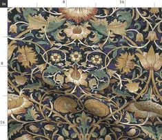 an intricately designed wallpaper with gold and blue flowers, leaves and swirls