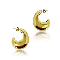 Introducing the Crescent Halo Golden Hoop Earrings - the perfect accessory for any occasion. The unique crescent shape design adds a touch of elegance to any outfit, while its versatility makes it easy to style up or down. These earrings are a must-have for any fashion-forward individual. Dimensions: approximately 0.5” x 1.5” x 1" 18k gold plated stainless steel, tarnish and water resistant Lead and Nickel free Trendy Crescent Earrings For Pierced Ears, Modern Crescent Hoop Earrings, Pierced, Modern Crescent Shaped Pierced Hoop Earrings, Modern Crescent Hoop Earrings, Modern Crescent-shaped Hoop Earrings, Golden Hoop Earrings, Golden Hoops, Crescent Shape, Scrunchie Hairstyles