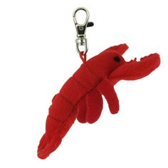 a red stuffed animal keychain with a lobster on it's front end