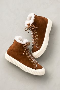 Wishing for winter-ready high-tops to make sporty sneaker season last all year long? Grab a pair of our Avery high-top sneakers, which offer a luxurious take on a timeless casual style. Made from water-resistant, full-grain Spanish suede, these lace-up kicks with bumper toes feature aesthetic ridged rubber platforms and thermo rubber outsoles for traction on slippery sidewalks. Plush shearling lining and breathable Merino wool-lined footbeds keep your feet cozy warm and comfy even as the mercury drops. Casual Winter High-top Sneakers With Textured Sole, Casual High-top Sneakers With Textured Sole For Winter, Leather High-top Sneakers For Winter Streetwear, Fall High-top Lace-up Sneakers With Textured Sole, Fall High-top Sneakers With Textured Sole And Lace-up, Trendy Fall High-top Sneakers With Rubber Sole, Trendy High-top Sneakers For Fall, Winter High-top Sneakers With Rubber Sole, Winter High-top Sneakers With Textured Sole For Streetwear