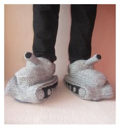 someone is wearing slippers made to look like a car