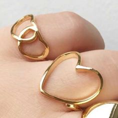 Material: Titanium Steel Fashion Element: Love Heart/Heart Shape Style: Cartoon Alloy Rings Suitable For Gifts, Heart-shaped Metal Ring Jewelry For Valentine's Day, Alloy Jewelry For Valentine's Day Anniversary, Heart-shaped Metal Ring For Valentine's Day, Trendy Alloy Midi Rings As Gift, Heart Shaped Alloy Jewelry For Anniversary, Gold Heart-shaped Alloy Jewelry, Heart-shaped Alloy Jewelry For Anniversary, Minimalist Alloy Rings For Gifts