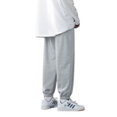 The Baggy Wide Leg Casual Sweatpants are the ideal winter companion for men who want functionality and flair in their wardrobe. Made from high-quality fabrics, these pants offer a comfortable and toasty fit, making them suitable for the chilly season. But that's not all! You won't ever have to worry about carrying your essentials separately because of the numerous compartments that were thoughtfully positioned throughout the design. Specifications: Applicable Season: Spring and Autumn Applicable Solid Straight Pants For Winter, Relaxed Fit Full Length Pants For Winter, Full Length Relaxed Fit Pants For Winter, Winter Streetwear Bottoms, Winter Full Length Pants With Relaxed Fit, Winter Full Length Relaxed Fit Pants, Gray Tapered Leg Winter Pants, Comfortable Straight Pants For Winter, Baggy Pants For Winter