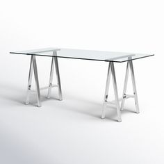 a glass table with metal legs on a white background