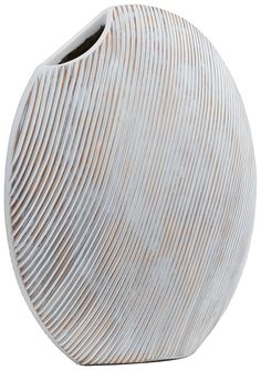 a large white vase with wavy lines on the outside and inside, sitting in front of a white background