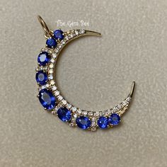 "Thank you for coming in! Genuine 14K GOLD diamond natural royal blue sapphire charm pendant. This particular Yellow gold large moon charm has small diamond accents(0.54 carat) and natural sapphire stones(2.4 carat) on it! THEY ARE STAMPED WITH \"14K 0.54ct\", but I could not show it clearly in the pictures. Amazing quality diamonds and finest glowing sapphire stones in this piece!  You will receive the pendant you see! DIMENSION: 26mmx32.5mm plus 3.5mm jump ring, 7.2mm top bail loop, 5.5mm hole MATERIAL: 14K Yellow Gold,  natural diamond, natural  royal blue sapphire" Sapphire Pendant With Single Cut Diamonds, Blue Rose Cut Diamond Pendant Jewelry, Celestial Sapphire Jewelry In 14k Gold, Celestial Sapphire Pendant Jewelry, Blue Crescent Gemstone Jewelry, Elegant Blue Jewelry With Moon Charm, Celestial Sapphire Gemstone Jewelry, Sapphire Stones, Buy Bead