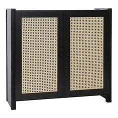 a black cabinet with wicker doors on it