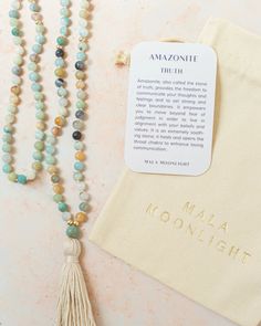 This Mala Beads Necklace is hand-knotted with Amazonite crystals and features 14K Gold-filled accent beads and a handmade cotton tassel. Hand-knotted traditional style This piece has the traditional 108 beads Spiritual Hand Knotted Beaded Necklace For Festivals, Spiritual Hand Knotted Beaded Necklaces For Festivals, Bohemian Necklaces With 8mm Beads For Rituals, Spiritual Tassel Necklace With 108 Round Beads, Bohemian 108 Beads Mala For Blessing, Holistic Hand Knotted Jewelry For Rituals, Bohemian Mala With 108 Beads For Blessing, Bohemian Necklace With Round Beads For Blessing, Adjustable Bohemian Mala For Blessings