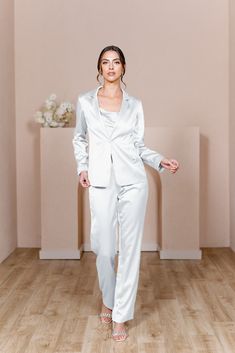 Model: Lindsey; Size: 4 Elegant Fitted Set For Wedding Night, Elegant Fitted Sets For Wedding Night, Elegant Fitted Wedding Night Set, Glamorous Spring Wedding Blazer, Elegant Satin Sets With Long Pants, Glamorous Satin Pants For Formal Occasions, Glamorous Satin Formal Pants, Glamorous Tailored Wedding Suits, Chic Long Sleeve Pantsuit For Wedding