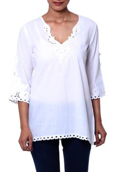 Delicate embroidery along the sleeves neckline and straight hem of this snow-white tunic add romance to a lightweight semi-sheer wear-anywhere piece. A perfect match for a pair of jeans or leggings. Basic White Blouse, Embroidered Caftan, Monochromatic Outfit, Summer Tunics, Timeless Wardrobe Staples, Cotton Tunic, White Tunic, Business Tops, Women Encouragement