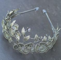 Step into the elegance of the Roaring 20s with this Gatsby-inspired bridal headpiece.  This exquisite headband features intricate crystal detailing, echoing the glamour of the Art Deco era. Perfect for vintage, Gatsby, or flapper-themed weddings, this bridal accessory adds a touch of timeless sophistication to any look. Its sparkling crystals and delicate floral motifs make it a stunning statement piece, ideal for brides seeking unique and luxurious wedding hair accessories. Complete your vintage bridal ensemble with this captivating hairpiece. Bridal Headpiece Vintage, Crystal Bridal Headband, Bridal Accessory, Vintage Wedding Hair, Themed Weddings, Luxurious Wedding, 1920s Art, Roaring 20s, 1920s Art Deco