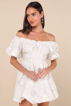 Get ready to be the sweetest babe at the party in the Lulus Adorable Crush Ivory Jacquard Off-the-Shoulder Mini Dress! Lightweight woven jacquard, with a floral design throughout, shapes this darling dress. Short puff sleeves (with elastic at the cuffs and decorative bows at the shoulder) frame an off-the-shoulder neckline with ruffle trim and an adjustable, elasticized drawstring that forms a playful matching bow at the center. Gathered bust tops a high, banded waist. Skirt has a flirty bubble Feminine White Off Shoulder Dress For Party, Cream Off-shoulder Party Dress, Cream Puff Sleeve Mini Dress For Party, Off-shoulder Cream Mini Dress For Brunch, Cream Off-shoulder Mini Dress For Brunch, White Off Shoulder Dress With Short Sleeves For Party, White Off Shoulder Short Sleeve Party Dress, Cream Off-shoulder Mini Dress, Cream Off-shoulder Dress For Brunch