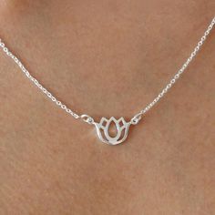 Lotus has spiritual symbolism amongst many cultures, but it's beauty and grace is undeniable! This delicate and detailed openwork tiny lotus flower is a perfect zen necklace. Material 925 Sterling Silver. Nickel free. Suitable for Sensitive Skin. Quantity & Measurement Adjustable length - 16 +2 inches Pendant - Lotus 12 x 8mm Closure - Round spring clasp Zen Necklace, Necklaces Layering, Lotus Necklace, Zen Yoga, Goddess Necklace, Horn Necklace, Luxury Earrings, Jewellery Necklace, Luxury Necklace