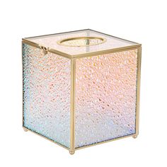 a small square candle holder in gold and multicolored sequins on a white background