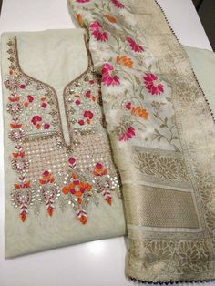 Item Overview ATHARVA Hand Embroidery Salwar Kameez w/Embroidery Neck Light Pista Chanderi/Banarsi Meenakari Silk Dupatta/Gota Patti Custom Stitch/Plazzos/Tunic/Patiala Salwar/Gift Dno. CH1570 Fabric:  * Shirt- Chanderi Silk - Embroidered Neck ( Beige) - 2.5 Mts Beautiful Hand Embroidery * Dupatta: Banarsi Silk Dupatta- Zari Meenakari Dupatta- 2.5 Mts- Latkans Tassels- (Motifs may wary) Maroon (Wine Shade * Bottom Santoon Silk 2.5 Mts. Excusive Hand Embroidered Party Wear Punjabi Suit. 🌷CUSTOMI Cotton Kurties, Partywear Suits, Kurti Embroidery, Ladies Suit, Indian Designer Suits, Punjabi Dress, Embroidery Tshirt, Embroidery Shoes, Patiala Salwar