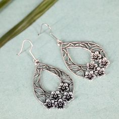 Indian Oxidized Silver Floral Drop Earrings | Teardrop Flower Earrings | Elegant Jewelry for Women | Oxidized Long Earrings Pakistani Jhumki Elevate your style with our exquisite Floral Drop Earrings, designed to bring a touch of elegance and charm to any outfit. Featuring a stunning teardrop flower design, these earrings are perfect for adding a graceful touch to both casual and formal looks. Charming Design: These earrings showcase a beautifully crafted floral motif with a teardrop shape that adds a sophisticated flair. The intricate flower design is detailed with delicate patterns, making each piece a unique and eye-catching accessory. Versatile and Elegant: Ideal for a wide range of occasions, from everyday wear to special events, these earrings complement a variety of outfits. Whether Teardrop Earrings With Flower Charm, Metal Teardrop Flower Earrings, Earrings Teardrop, Indian Earrings, Earrings Elegant, Oxidized Silver, Elegant Earrings, Elegant Jewelry, Jewelry For Women