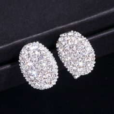 The perfect elegant statement earring for your next special event featuring bright light catching cubic zirconia crystals. material: cubic zirconia type: earring style: formal color: as shown gender: women