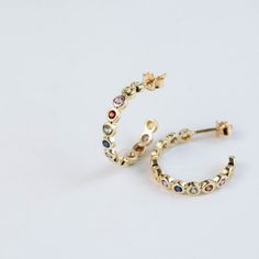 Rainbow sapphire hoop earring in 14K solid gold in bezel setting. Unique eternity solid gold hoops for women. The best birthday gift for her!100% handcrafted with love!PRODUCT DETAILS• Metal: 14K solid gold, 14K white gold or 14K rose gold• Gemstone: 26 Sapphires, Round cut• Sapphires' Weight: 0.97ct totalHOW TO ORDER - CUSTOM ORDERS• Choose from the drop-down menus the available options (Material) and leave us a note for any special requirements.• For special orders (if you wish the ring to mat 14k Gold Huggie Jewelry With Bezel Setting, Yellow Gold Hoop Earrings With Bezel Setting, Fine Jewelry Hoop Earrings With Bezel Setting For Anniversary, Gold Hoop Earrings With Birthstone - Fine Jewelry, 14k Yellow Gold Hoop Earrings With Bezel Setting, Gold Hoop Earrings With Birthstone, Everyday 14k Gold Gemstone Hoop Earrings, Everyday 14k Gold Hoop Earrings With Gemstones, Gold Plated Yellow Gold Hoop Earrings With Gemstone