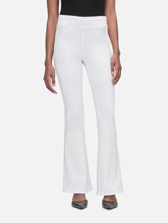 The Jetset Flare -- White Elegant Stretch Wide Leg Pants With Flared Hem, Elegant Fitted Wide Leg Pants With Flared Hem, Elegant Stretch Flares For Spring, Elegant Stretch Elastane Flares, Chic Stretch Wide Leg Pants With Flared Hem, High Rise Stretch Flares For Summer, White Fitted Bottoms With Flared Hem, Stretch High Rise Flares For Summer, Sleek Stretch Wide Leg Pants For Spring