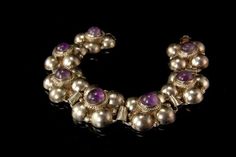 "This is a very beautiful, vintage and very unique MEXICAN AMETHYST CABOCHON SILVER bracelet (weight 33.3g). The bracelet has a marvelous and chic style with nice flower shape, amethyst cabochons and silver(bottom has MEXICO SILVER). The bracelet has a very extravagant and elegant feel to it. It measures 7\" long and 3/4\" wide. The bracelet is in good condition, has small dent. 0.7 BR" Nice Flower, Rose Gold Bangle, Brass Bangle, Hinged Bracelet, Vintage Mexican, Photo Bracelet, Vintage Diamond, Amazing Flowers, Gold Bangles