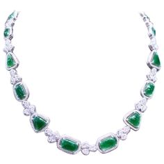 An exclusive design, so refined and glamour , a very piece of art, by Italian designer. Necklace come in 18k gold with 14 pieces of natural untreated Jades , excellent quality, of 18.68 carats, from Myanmar, in cabochon cut, in amazing green , and 991 pieces of natural diamonds of 7.66 carats, F color and VS clarity. It is a high jewels piece. Handcrafted by artisan goldsmith. Excellent manufacture and quality. Complete with AIG report. Length is about 18 inches, but it is resizable on request. Luxury Pear-shaped Emerald Gemstone Necklace, Pear-shaped Emerald Gemstone Necklace For Formal Occasions, Pear-shaped Emerald Gemstone Necklace For Formal Events, Exquisite Pear-shaped Emerald Necklace For Formal Occasions, Luxury Green Diamond Gemstone Necklace, Luxury Green Diamond Necklace With Gemstone, Luxury Green Gemstone Diamond Necklace, Exquisite Diamond And Emerald Formal Necklace, Exquisite Diamond Emerald Necklace For Formal Occasions