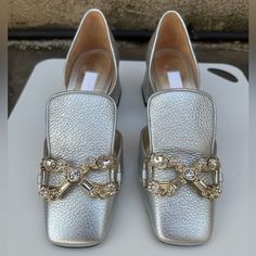 Gorgeous Pair Of Unworn D’orsay Loafers In Silver Pebbled Leather With Rhinestone Embellishments From Suzanne Rae. They Are The Best Mix Of Classy And Funkydress Down Your Party Dresses And Dress Up Your Jeans. They Are A Long 37 And Therefore Better For Someone Who Is 7/7.5 Than Someone Who Is 6.5/7. (I Sized Up From 6.5 And They Are Too Big For Me.) Original Dust Bag Included But No Box. Elegant Slip-on Flats With Almond Toe, Elegant Rhinestone Slip-on Loafers, Elegant Flat Court Shoes For Evening, Elegant Flat Evening Court Shoes, Elegant Slip-on Court Shoes With Low Heel, Elegant Closed Toe Flats With Rhinestones, Elegant Low Heel Flats With Rhinestones, Elegant Low-heel Flats With Rhinestones, Elegant Slip-on Court Shoes With Closed Toe