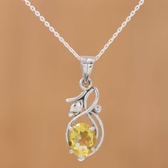 Smooth and gleaming rhodium plated sterling silver provides a fitting frame for a pretty gemstone in this necklace from India's Hema. Like an emerging bud, a four-carat oval citrine glows warmly. The pendant centers a classic sterling silver cable chain. Citrine Pendant, Citrine Necklace, Magical Jewelry, Moonstone Bracelet, Yellow Citrine, Citrine Stone, Sterling Silver Dangle Earrings, Silver Earrings Dangle, Pretty Jewellery